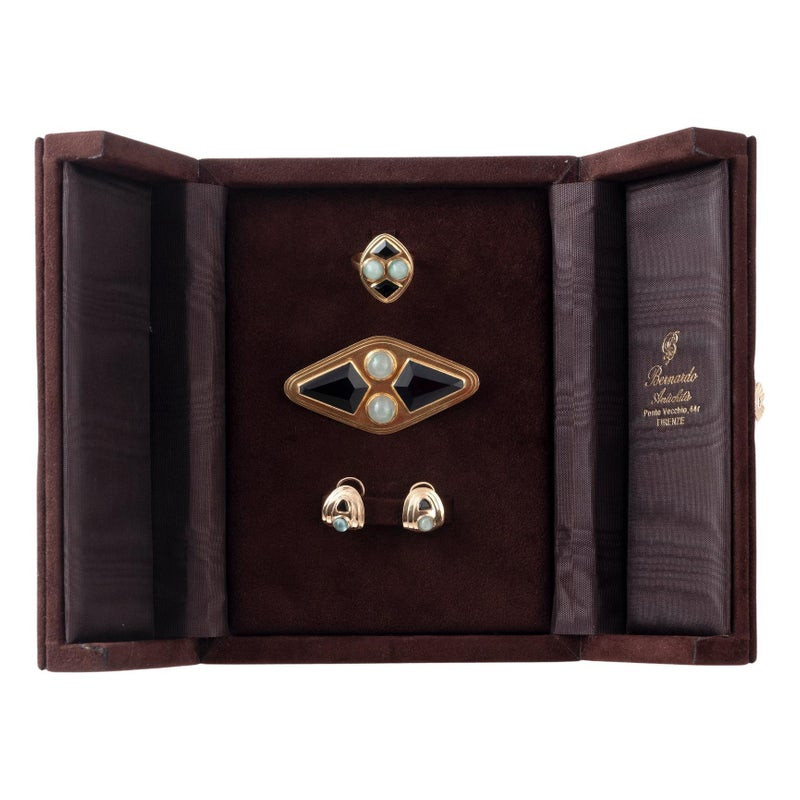 An Art Déco 18kt Gold Onyx And Jade Set By RENE FOY