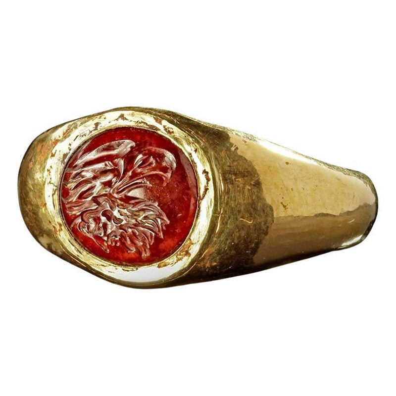 Roman Gold Ring with Garnet Intaglio of an Eagle's Head 1st century A.D.
