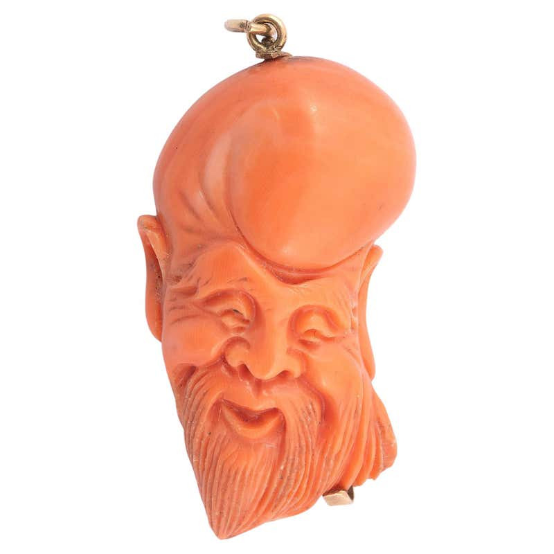 Gold and Cerasuolo Coral Carving Shoulao Pendant